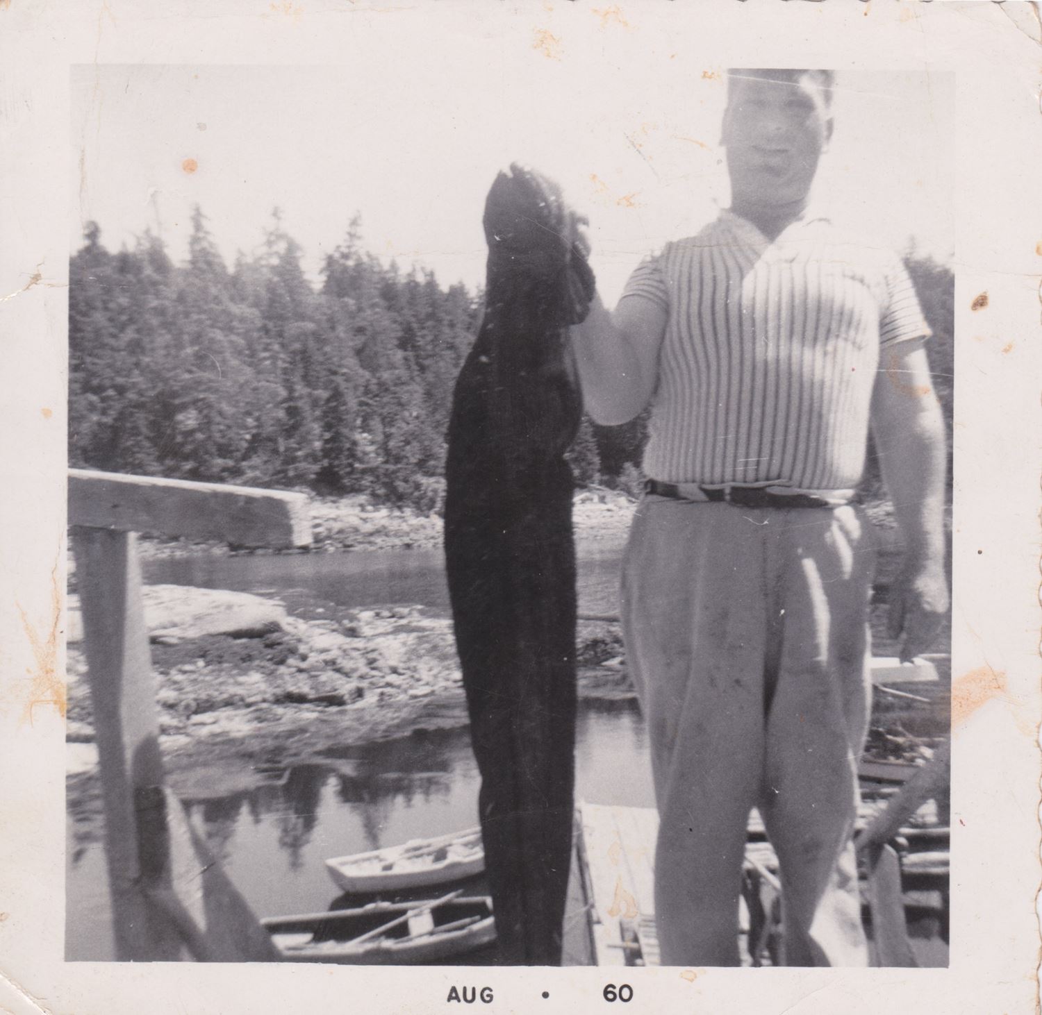 Grandpa with an Eel Grandpa holding an eel