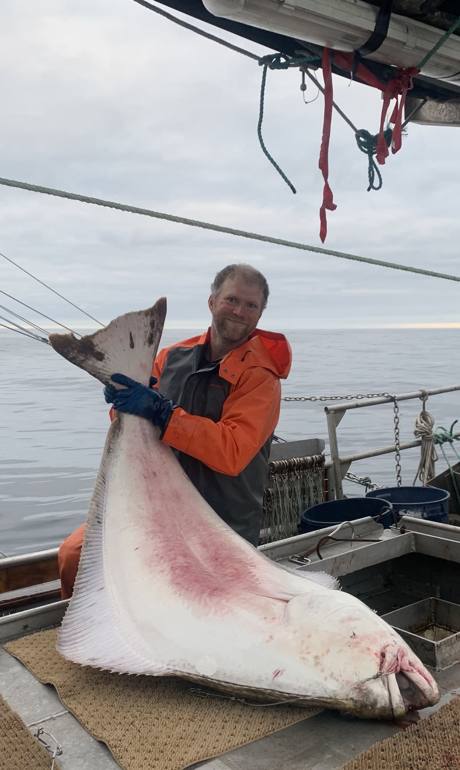halibut-wild-catch Posing with a caught halibut